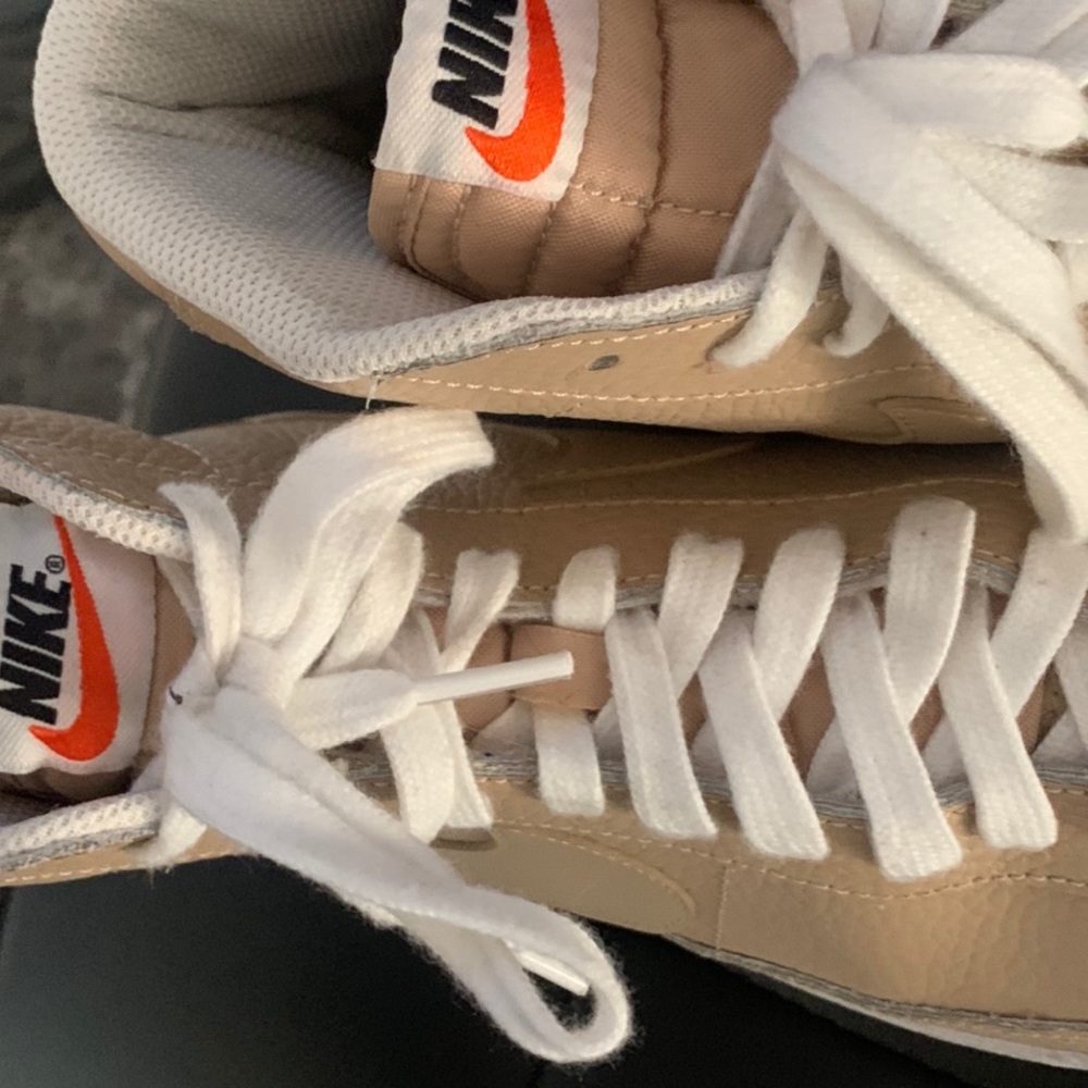 Tan nikes worn once in good condition